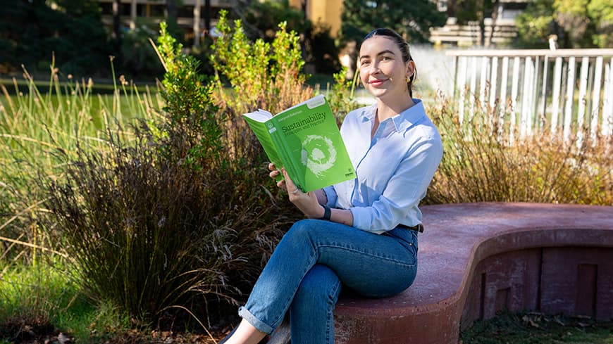 Young woman reading a book