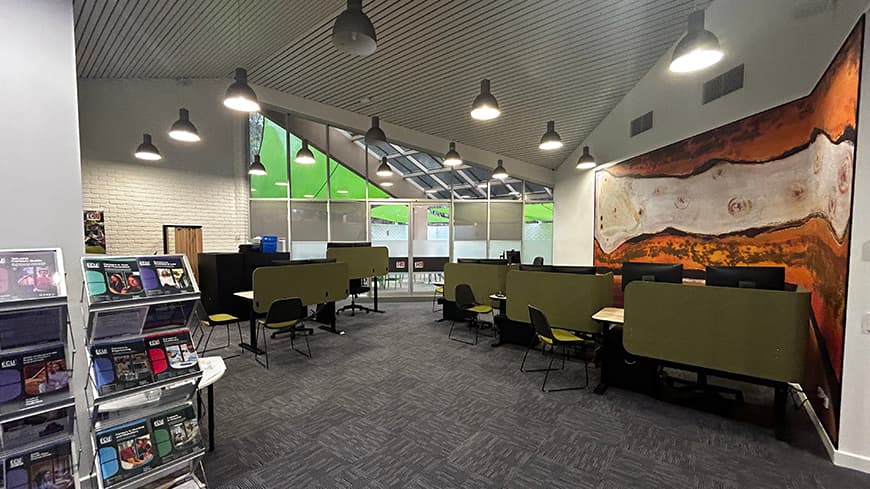 Student HUb at South West campus with ochre and sandstone abstract mural on right wall