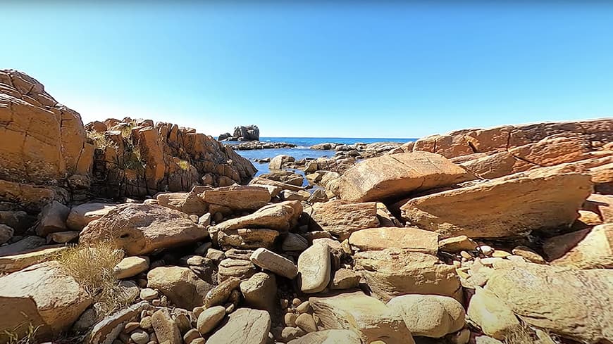 a rocky coastal vista scene from the VR experience