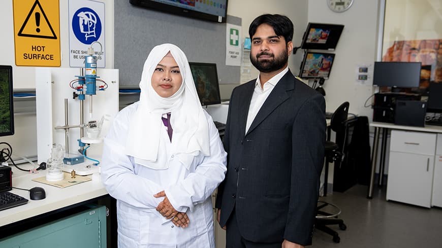 Woman and man in university laboratory