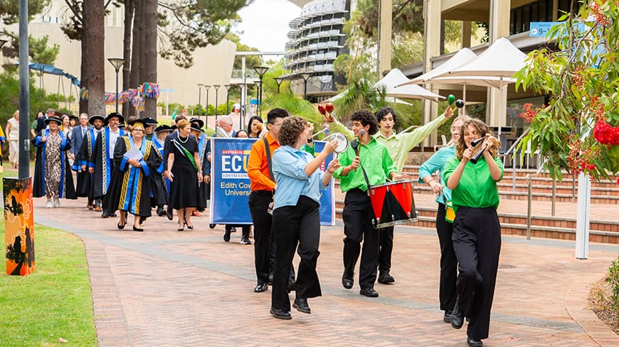 procession of people through Joondalup campus