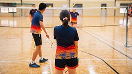 students playing badminton