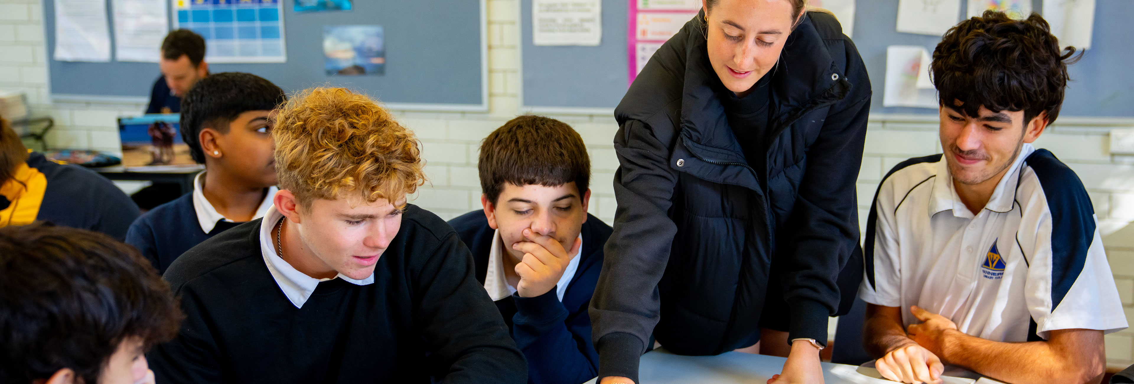 ECU School of Education Teacher Education prac student working with Secondary school students in the classroom