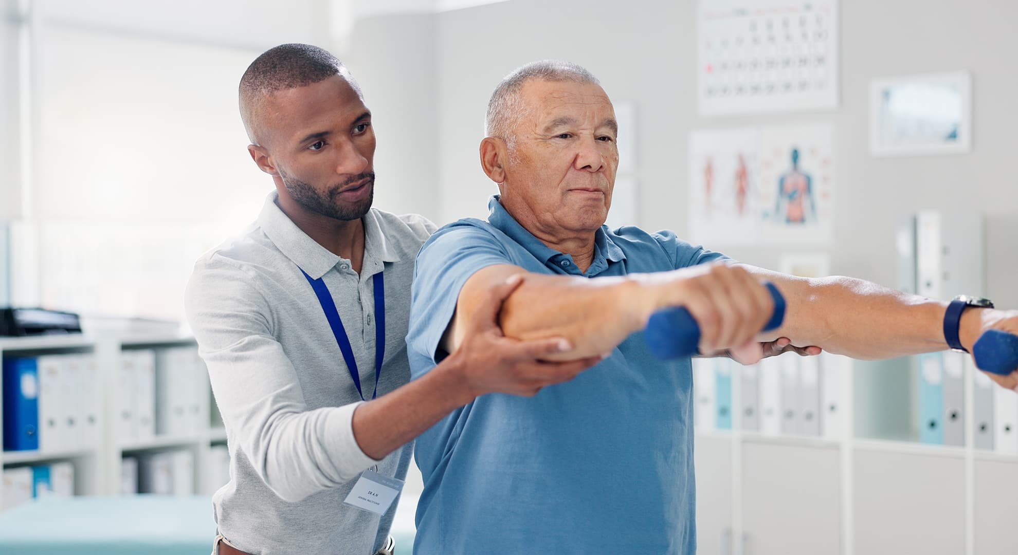 Therapist helping older man