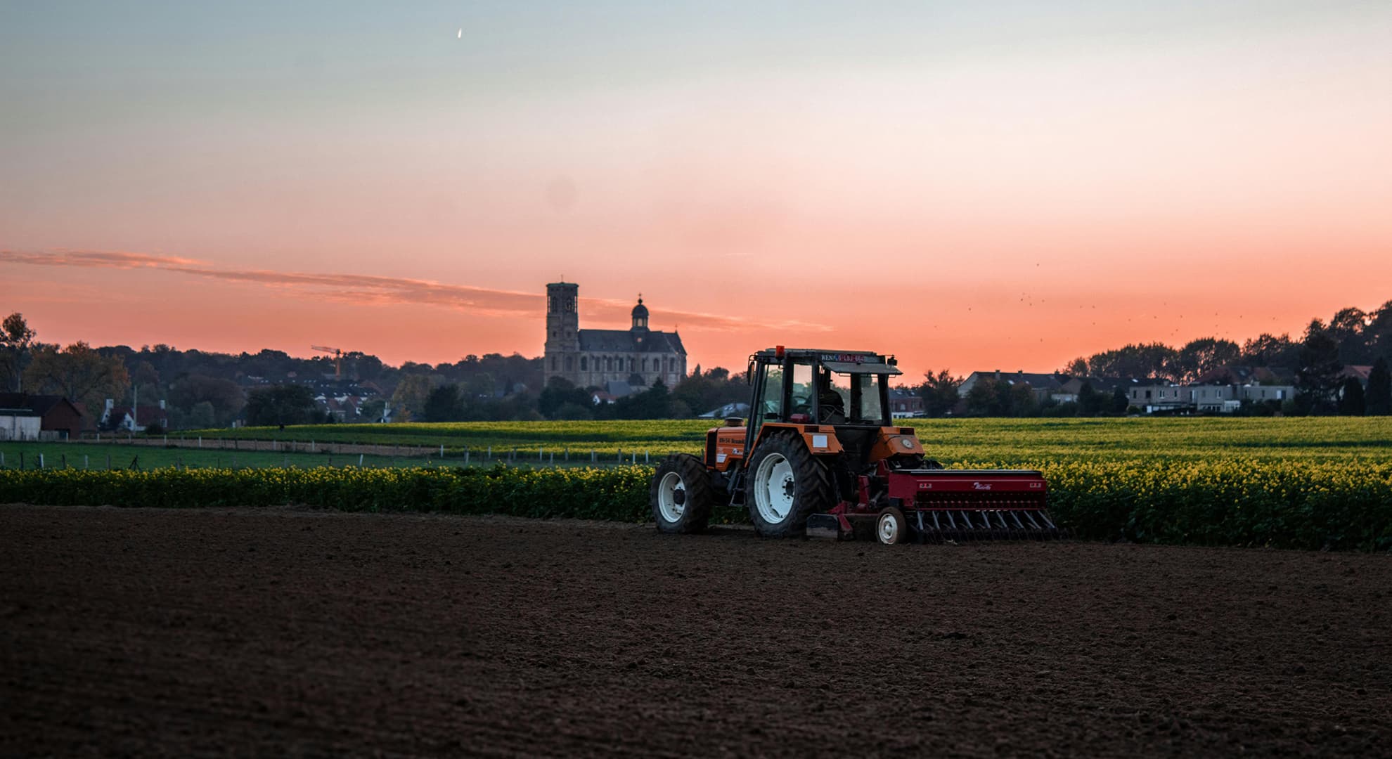 Tractor on plowed land