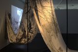 Artwork drawing on fabric in gallery exhibition