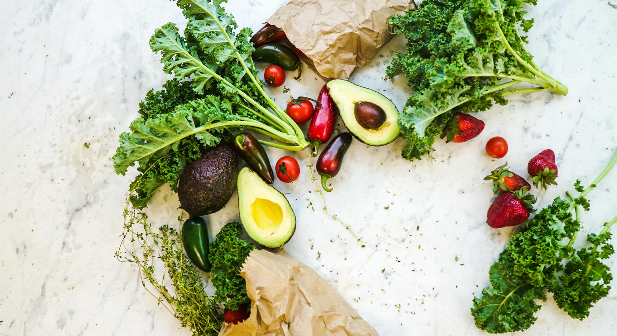 Vegetables and brown paper bags.