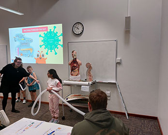 Children's University members learning the importance of Gut Health and participating in the Blue Poop Challenge.