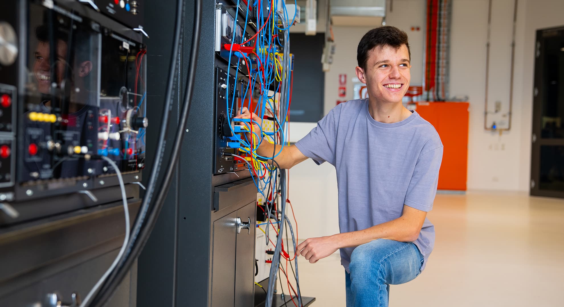 Male university student in a laboratory