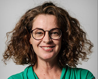 A headshot portrait photo of Dr Christine Cunningham