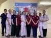 Students visiting Vietnamese Hospital ward