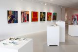 Painted and sculptured artwork on exhibition gallery walls