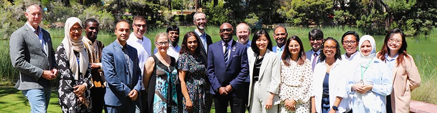 Centre researchers standing in garden