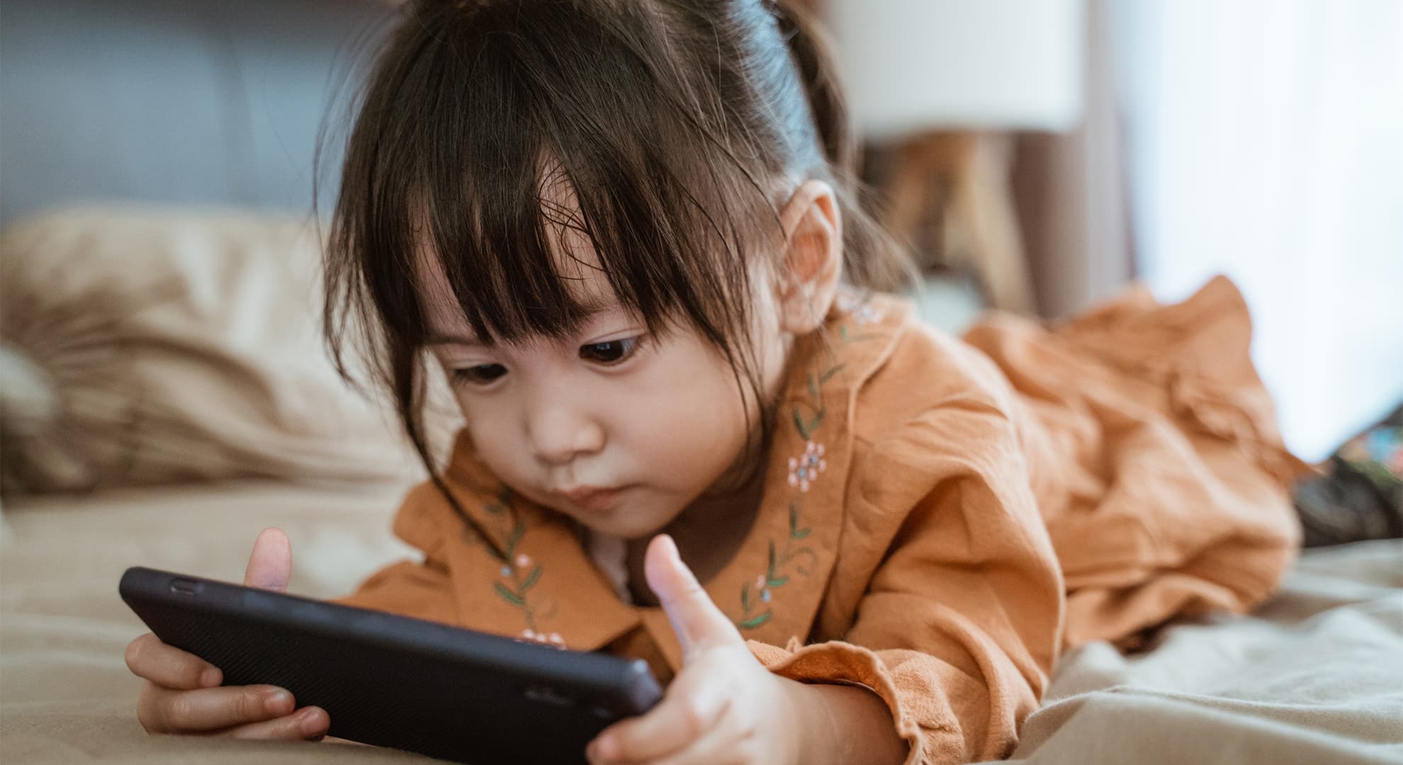 Child using ipad