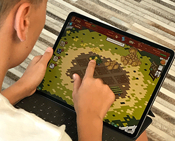 Student playing the Farm to Fork app