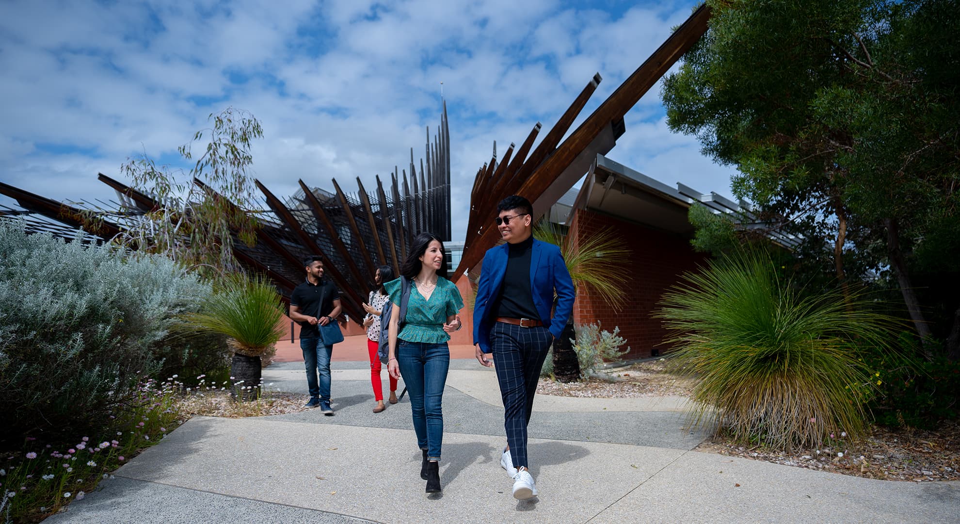 Students walking in front of Building 1 at ECU's Joondalup campus.