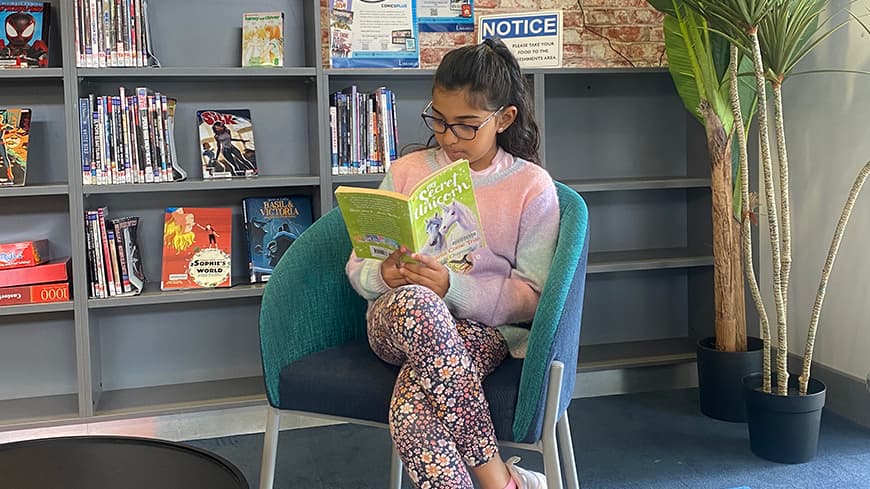 girl reading a book.