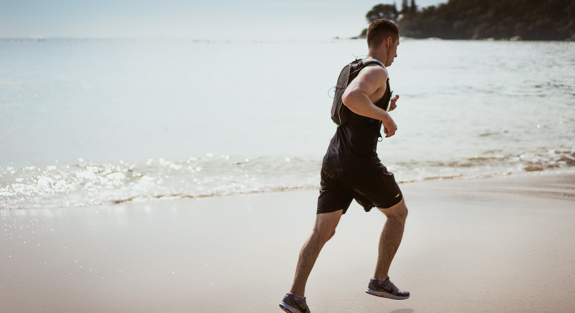 Man running on a beach