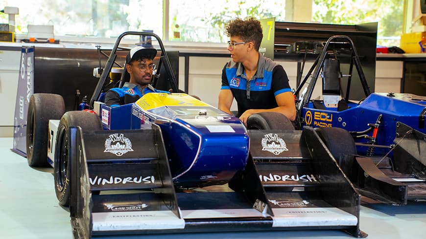 Two men in a racing car